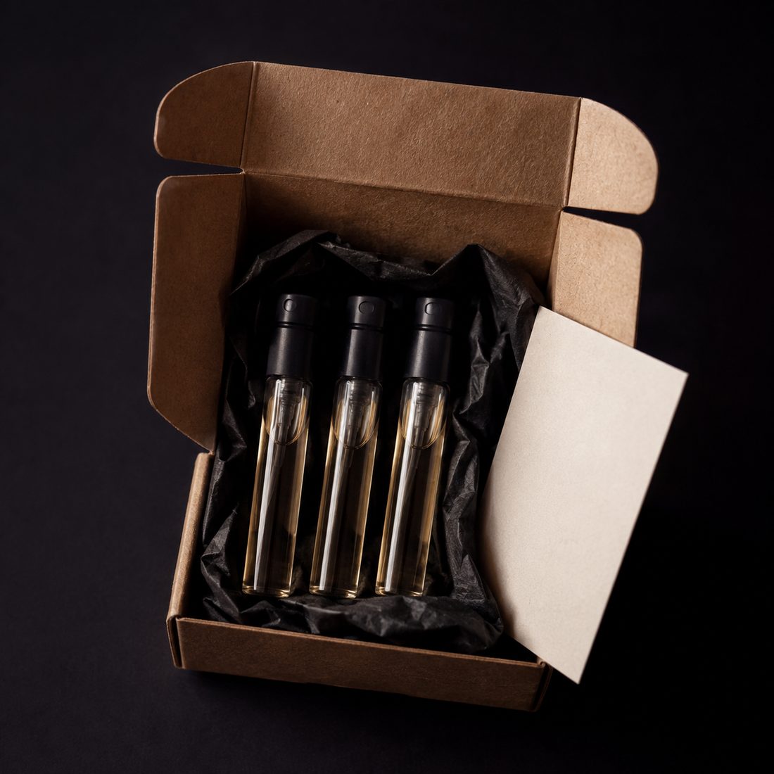 Three vials and a printed card in a kraft mailer